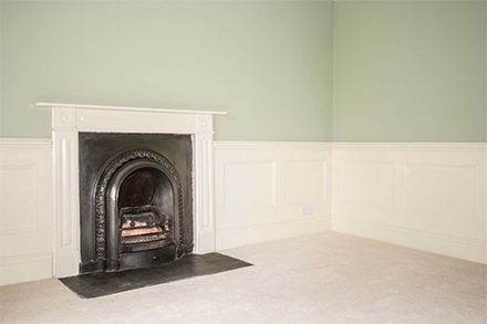 Panelling next to fireplace