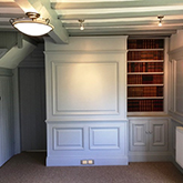 superior wall panelling with built in bookcase