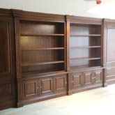 secret oak  panels within wall panelling and bookcase design made in Britian by wall panelling experts