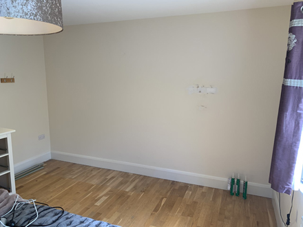 Before.An unsightly Plasterboarded wall. before the quick fit shaker wall panelling makeover